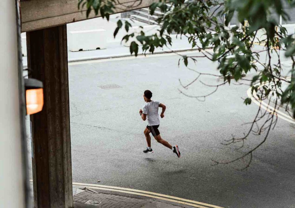 Man running alone in a city
