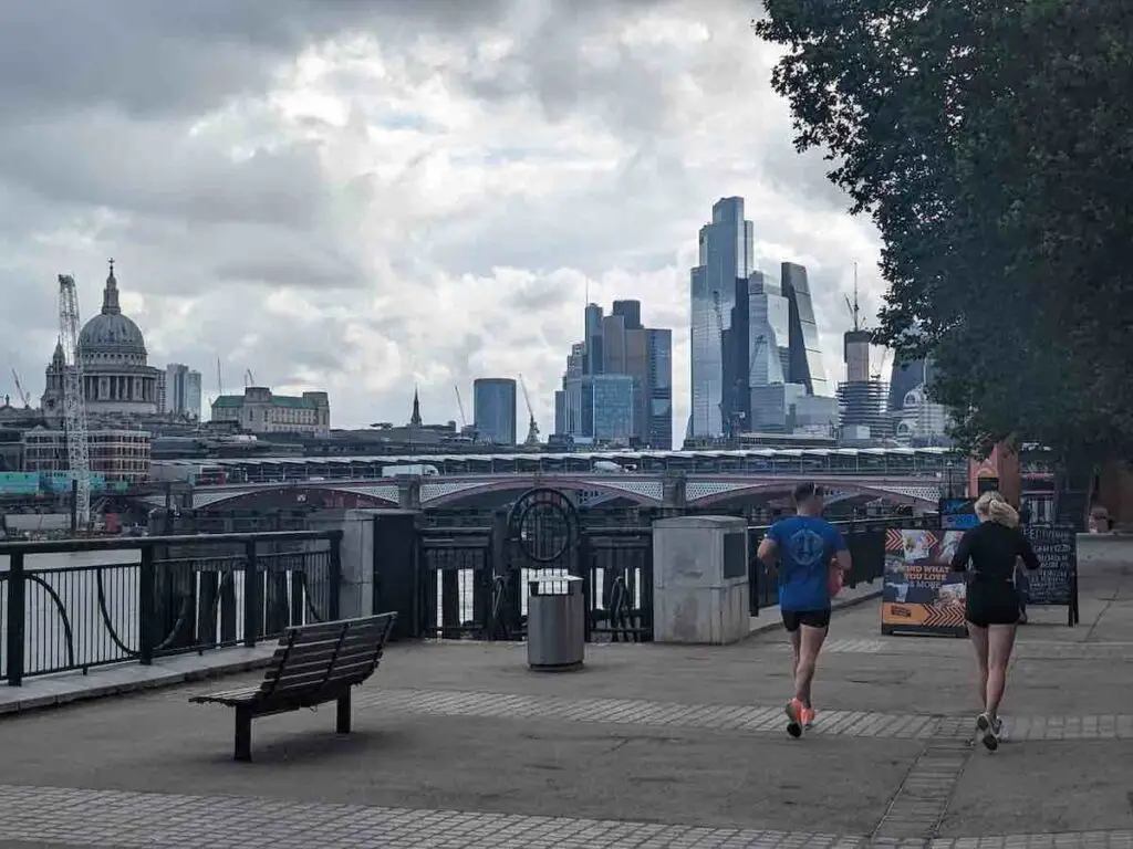 Tourists running on London Southbank